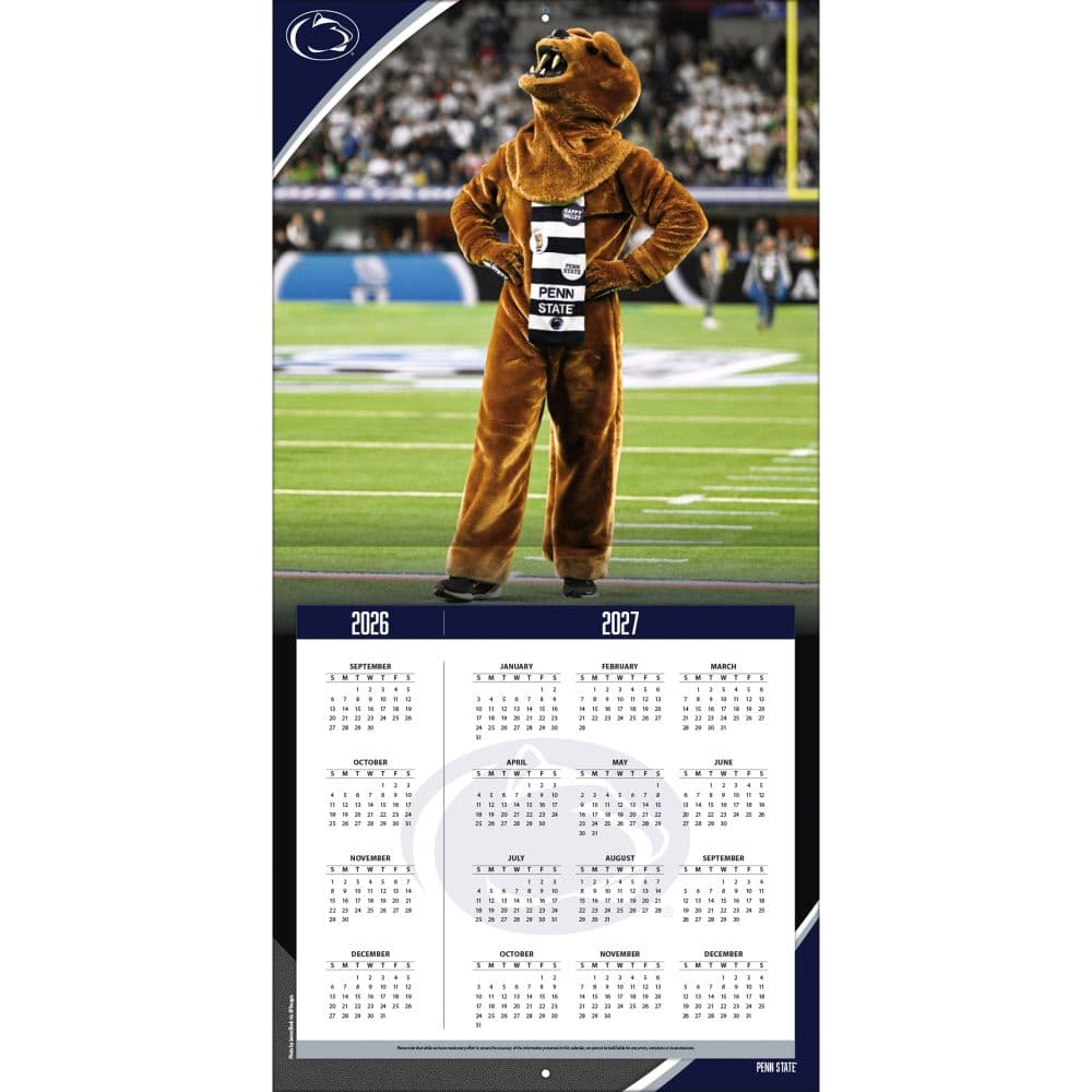 Young family planning with a printed Penn State calendar on kitchen table