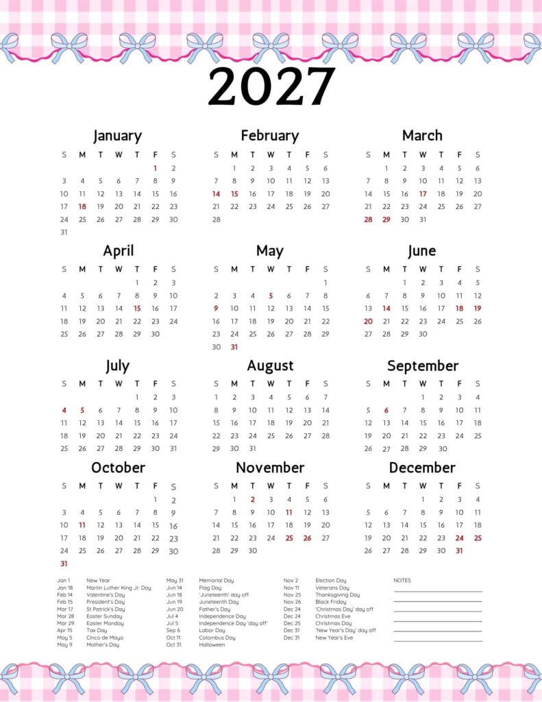 Family planning wall calendar with sticky notes and pens