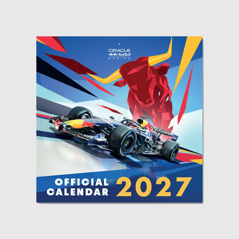 Close-up of a printed calendar page with color blocks on a desk