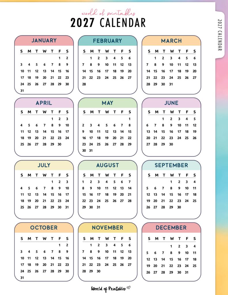 Printed Year 2027 Calendar spread on classroom desk.