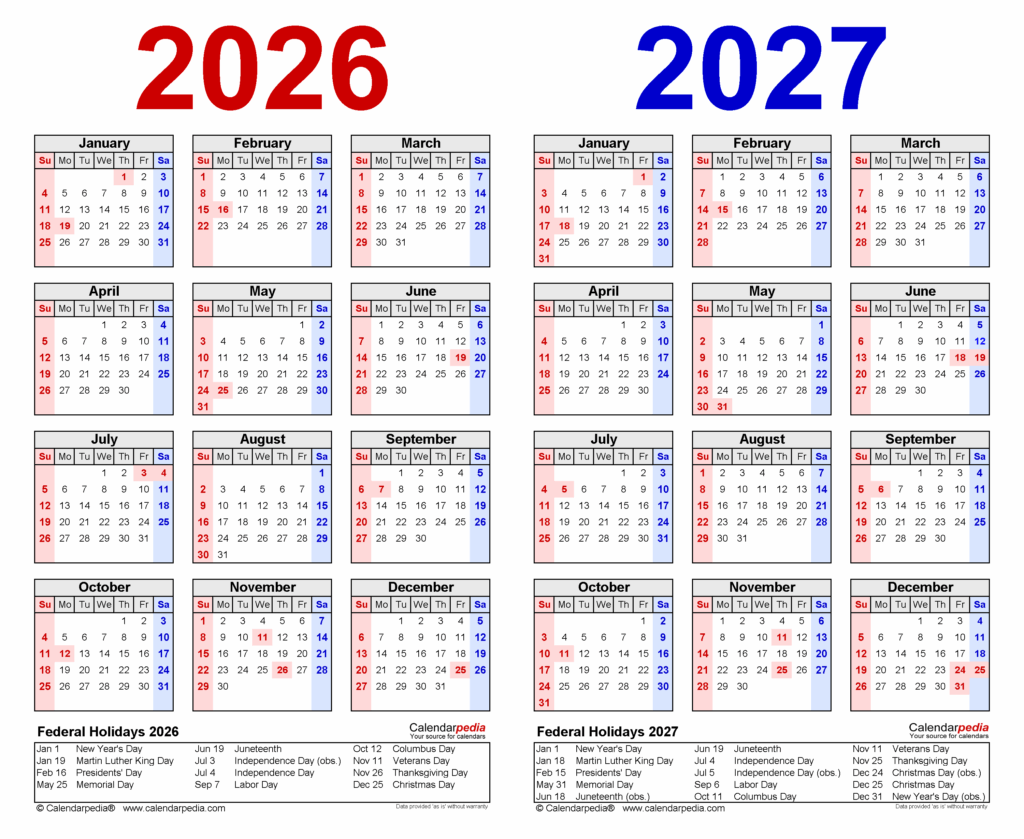 Colorful student planners spread across a classroom desk